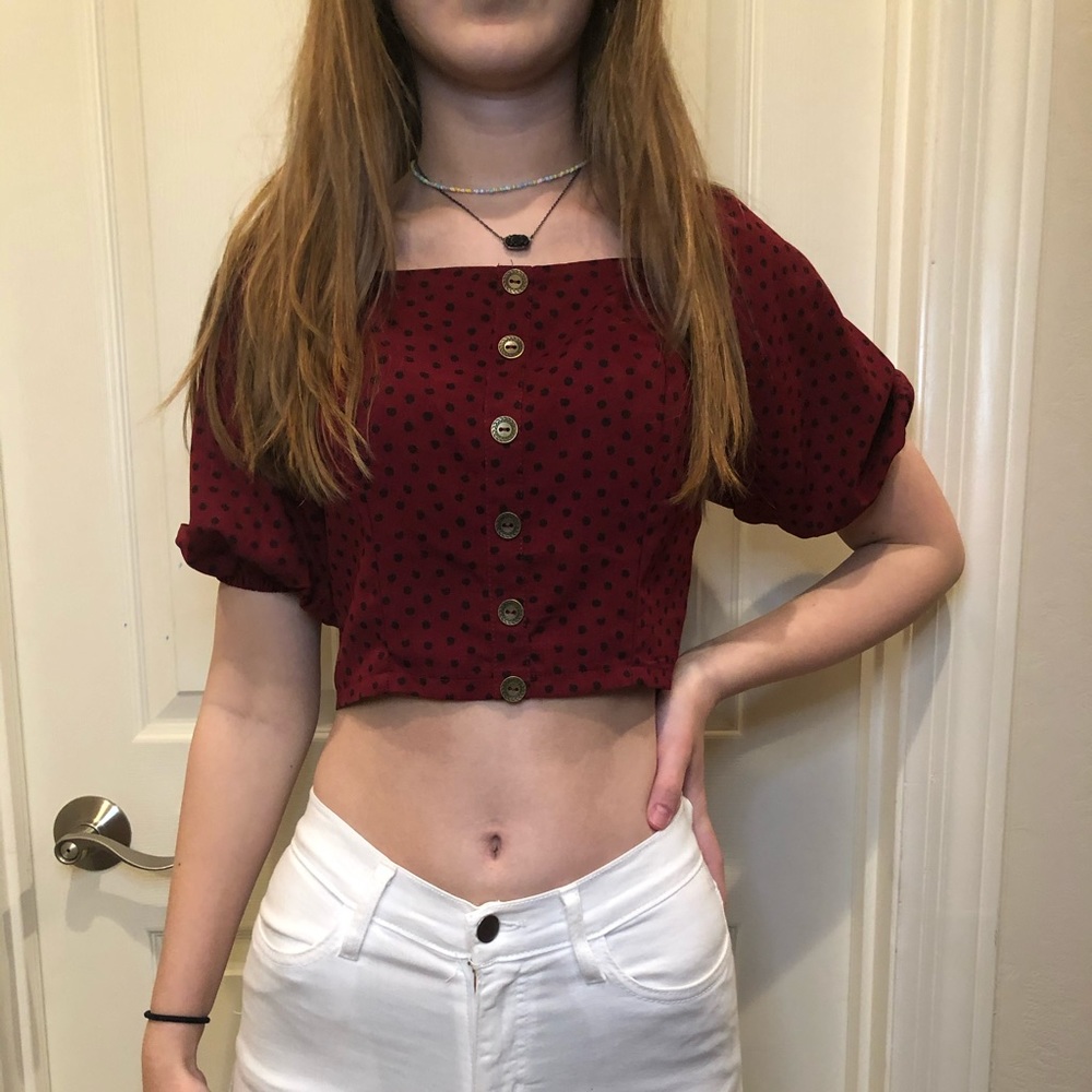 red polka dot shirt